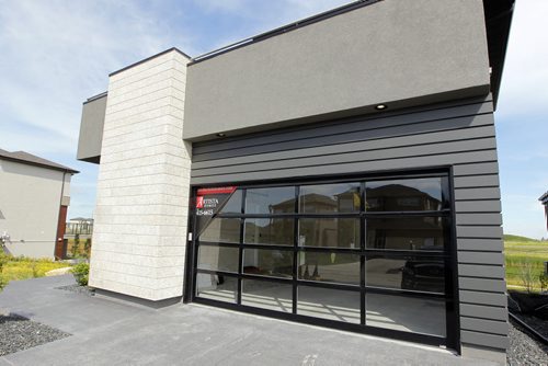 BORIS MINKEVICH / WINNIPEG FREE PRESS 45 East Plains Drive in Sage Creek. Artista Homes. Glass panelled garage door.  July 4, 2016