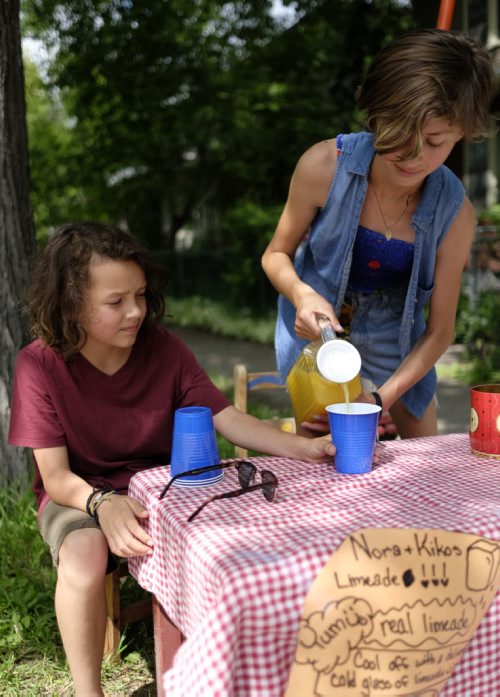 ZACHARY PRONG /  WINNIPEG FREE PRESS  Kiko, left, and Nora at their Lemonade Stand in Wolseley. The cousins are trying to raise money for Folk Fest. July 4, 2016.