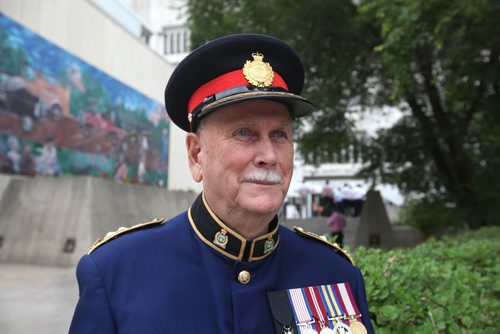 RUTH BONNEVILLE / WINNIPEG FREE PRESS  Past police chief, Herb Stephen, has his portrait taken in front of the PSB building  just before ceremony was held to bid the building goodbye Tuesday.  On July 5th, the doors to the Public Safety Building will officially close.  July 05, 2016