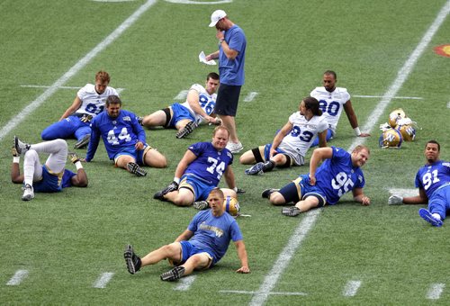 BORIS MINKEVICH / WINNIPEG FREE PRESS WINNIPEG BLUE BOMBERS - Practice at Investors Group Field. After the practice the players do stretching and some yoga.  July 5, 2016