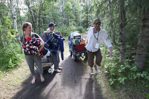 JOE BRYKSA / WINNIPEG FREE PRESS Campers arrive at their campsites to kick off the 2016 Winnipeg Folk Fest at Birds Hill Park Wednesday morning-L to R Alysha Guenther, Johanna Johnson, and Paul Mann head into the campground. Festival music starts tomorrow and will run until July 10-July 06, 2016 -(Standup Photo)