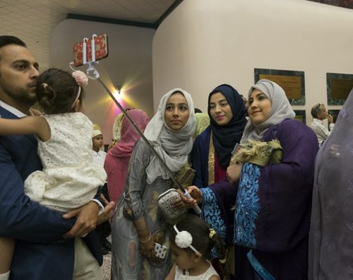ZACHARY PRONG / WINNIPEG FREE PRESS  Nadia, Hina and Samia take a selfie at the RBC Convention Centre where thousands of people gathered for Eid celebrations on July 6, 2016. Eid marks the end of the Muslim holy month of Ramadam.