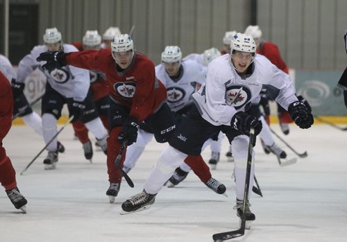 RUTH BONNEVILLE / WINNIPEG FREE PRESS  Hockey players practice on ice with coaches in the Winnipeg Jets Development Camp at IcePlex Wednesday morning.   See Tim Campbell story.      July 06, 2016RUTH BONNEVILLE / WINNIPEG FREE PRESS  Hockey players practices on ice in the Winnipeg Jets Development Camp at IcePlex Wednesday morning.  General shot of players.   See Tim Campbell story.       July 06, 2016