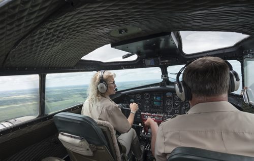 DAVID LIPNOWSKI / WINNIPEG FREE PRESS  Ken and Lorraine Morris pilot a Boeing B-17 Bomber (Flying Fortress) during a media flight from the Gimli Airport Wednesday July 6, 2016. The World War 2 era plane is one of only 13 aircraft of its type still flying.
