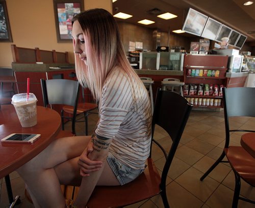 PHIL HOSSACK / WINNIPEG FREE PRESS - Andra McAulay sits in a Steinbach coffee shop reflecting on the community's upcoming Pride events. She'll be taking part in the Pride Parade and Rally in the community Saturday. See Melissa Martin story.  July 6, 2016