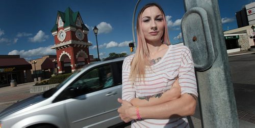 PHIL HOSSACK / WINNIPEG FREE PRESS - Andra McAulay poses in downtown Steinbach along the route the Pride Parade will take through the community Saturday. See Melissa Martin story.  July 6, 2016