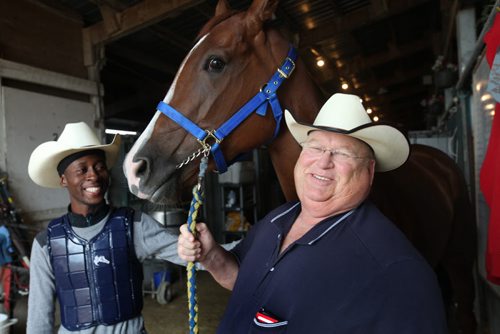 RUTH BONNEVILLE / WINNIPEG FREE PRESS   Horse Trainer Ardell Sayler (right) with horse Girl Boss and jockeyTyrone Nelson in the stables at Assiniboine Downs.  Story about 12-time leading trainer Ardell Sayler who wins Canada Day Stakes with Girl Boss  See  George Williams Story.   July 07, 2016