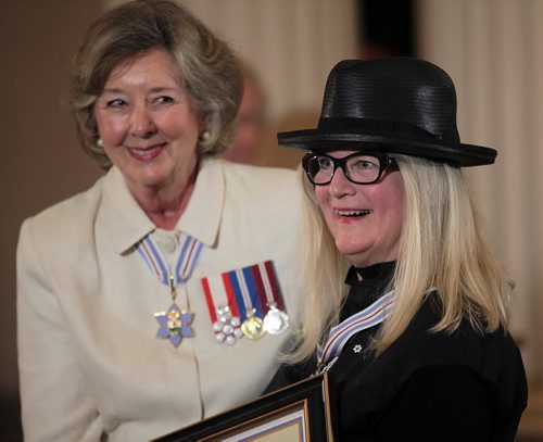 PHIL HOSSACK / WINNIPEG FREE PRESS - Lt Govenor Janice Filman and Wanda Koop both look suprised to find themselves presenting and receiving the Order of Canada respectively. See story. July 7, 2016