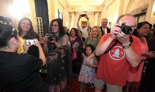 PHIL HOSSACK / WINNIPEG FREE PRESS - See story. Friends family and fans of the most recent receipients of the Order of Manitoba scramble for a position to take a portrait Thursday at the Legislature after eleven new members of the order were presented. See story. July 7, 2016