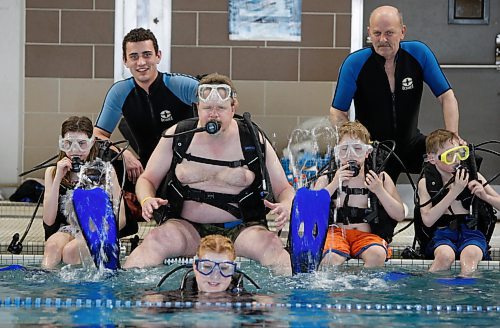 BORIS MINKEVICH / WINNIPEG FREE PRESS  080416 Doug Speirs lears how to scuba dive with some kids at Elmwood Kildonan Pool. 3 Fathoms scuba instructors Ian Sutherland, right top, and Jason Herlick, left top, also pose for a photo with the crew.