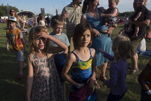 ZACHARY PRONG / WINNIPEG FREE PRESS  Children play with bubbles at Folkfest on July 8, 2016.