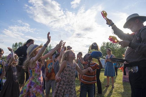 ZACHARY PRONG / WINNIPEG FREE PRESS  Children play with bubbles at Folkfest on July 8, 2016.