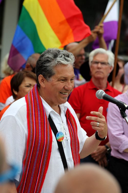 RUTH BONNEVILLE / WINNIPEG FREE PRESS  MP Dan Vandal reads a message from Prime Minister Justin Trudeau  to thousands who  gathered on the steps of City Hall to celebrate Steinbach's 1st ever Pride march Saturday.    July 09, 2016