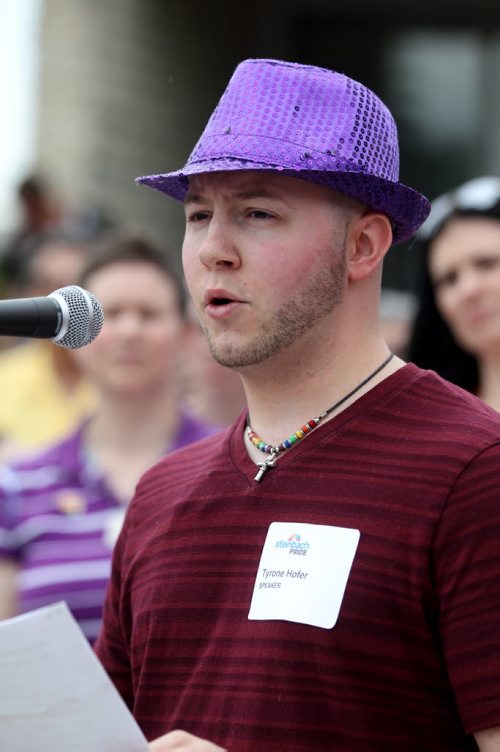 RUTH BONNEVILLE / WINNIPEG FREE PRESS  Tyrone Hofer talks to thousands who gathered on the steps of City Hall to celebrate Steinbach's 1st ever Pride march Saturday.  July 09, 2016