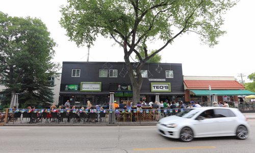 TREVOR HAGAN / WINNIPEG FREE PRESS A packed house inside and outside on the patio at Teo's on Corydon Avenue to watch the Euro 2016 soccer final, Sunday, July 10, 2016.