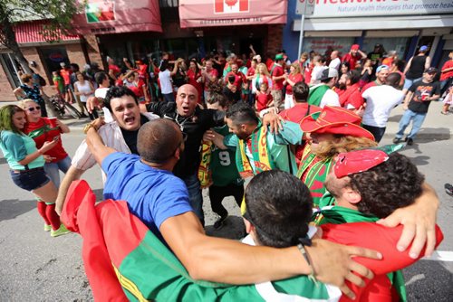 TREVOR HAGAN / WINNIPEG FREE PRESS Portugal fans on Sargent at Maryland after their team defeated France to win the Euro 2016 soccer final, Sunday, July 10, 2016.