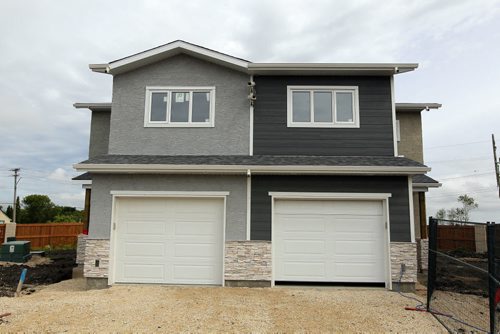 BORIS MINKEVICH / WINNIPEG FREE PRESS NEW HOMES - 255 Peguis Street in Transcona. Realtor Sabie Brar. New side by side houses.  Side by side. The one on the right is the house featured. July 11, 2016