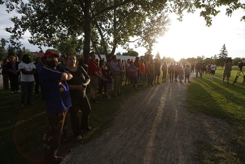 JOHN WOODS / WINNIPEG FREE PRESS Family and friends gather at a vigil for Thelma Krull at Civic Park Monday, July 11, 2016.