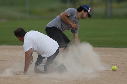 JOHN WOODS / WINNIPEG FREE PRESS Bill Robertson of team Ballzinga! slides into second to beat the throw at Buhler Recreation Park Monday, July 11, 2016. Park administration has gone to the city for financial help.