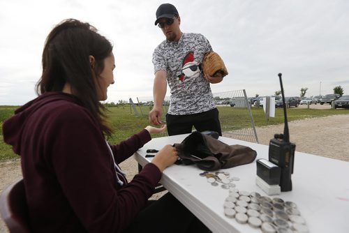 JOHN WOODS / WINNIPEG FREE PRESS A park staff person collects $3 from each person who enters at Buhler Recreation Park Monday, July 11, 2016. Park administration has gone to the city for financial help.