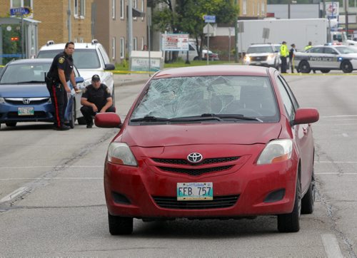 BORIS MINKEVICH / WINNIPEG FREE PRESS NEWS - A car crash closed down Portage Ave. in both directions between Cavell Drive and Hampton Street. The red Toyota involved in crash was in the east bound lane. No other info on crash..  July 12, 2016