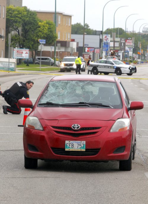BORIS MINKEVICH / WINNIPEG FREE PRESS NEWS - A car crash closed down Portage Ave. in both directions. No other info on crash..  July 12, 2016