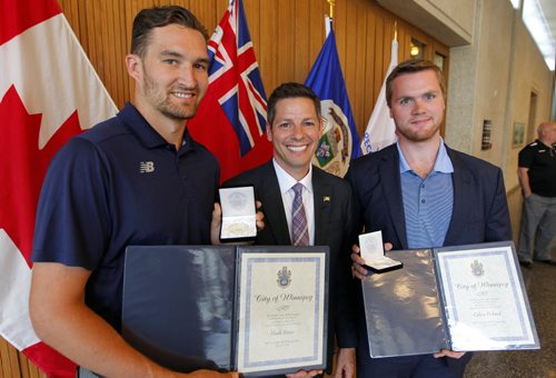 BORIS MINKEVICH / WINNIPEG FREE PRESS NEWS -Winnipeg Mayor Brian Bowman, centre,  presented some awards to some NHL players at City Hall today. NHL Players Mark Stone, left,  and Calvin Pickard, right, were presented the The Mayors Award for Sports Excellence. July 12, 2016