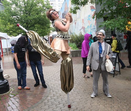 JOE BRYKSA / WINNIPEG FREE PRESSWinnipeg Fringe Festival kickoff in the noon hour in Old Market Square- The Winnipeg Fringe Festival will run for 12 days and feature over 160 shows. The Philip and Lucinda Show a acrobatic comedy enters the afternoon kickoff -  July 13, 2016  -(Standup Photo)