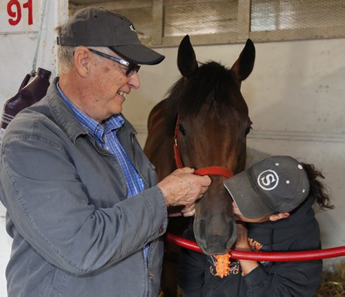 BORIS MINKEVICH / WINNIPEG FREE PRESS DERBY HORSES - (left) Gary Danelson trains a possible derby horse named Power Driven, a three year old colt. Groom named Laura Garrett (right) was there too kissing the horse. July 14, 2016