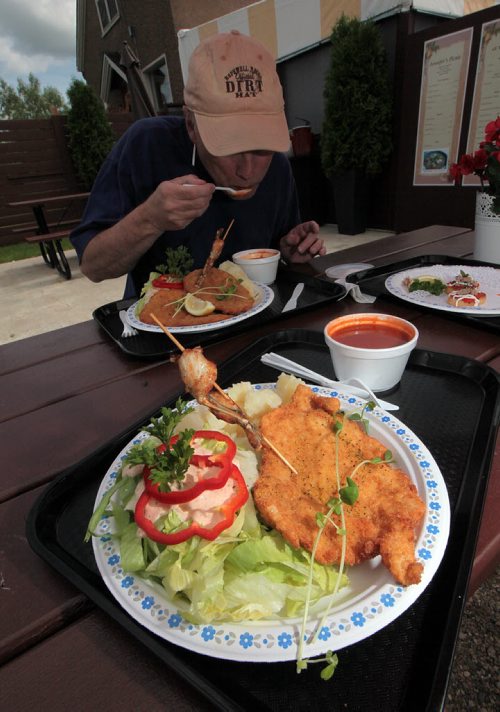 PHIL HOSSACK / WINNIPEG FREE PRESS -  A plate of Lemon Chicken, boiled potatoe and salad with a side bown of Kangaroo / Tomatoe soup at Jennifer's Picnic in Seven Sisters Falls. See Bill Redekop story.  July 14, 2016