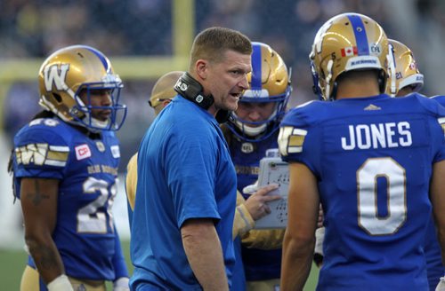 RUTH BONNEVILLE / WINNIPEG FREE PRESS  The Winnipeg Blue Bombers head coach Mike O'Shea on the field directing his team during  Bombers hosting Eskimos game at Investors Group Stadium Thursday night.    July 14, 2016