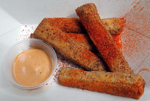 BORIS MINKEVICH / WINNIPEG FREE PRESS Fusian Sushi makes Spicy Tofu Fries that are crispy and spicy served with shichimi sause. Winnipeg Free Press food writer Alison Gillmor and FP's Ben MacPhee-Sigurdson, who writes about wine, beer and spirits, test out The Common at the Forks. July 12, 2016