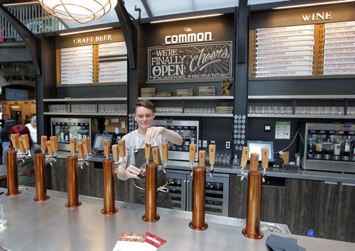 BORIS MINKEVICH / WINNIPEG FREE PRESS There are 20 beer taps for bartender Zac Chizda to pull at The Common. Winnipeg Free Press food writer Alison Gillmor and FP's Ben MacPhee-Sigurdson, who writes about wine, beer and spirits, test out The Common at the Forks. July 12, 2016