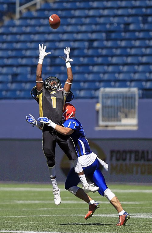 PHIL HOSSACK / WINNIPEG FREE PRESS -   Manitoba Gold receiver #1 Abdul-Karim Gassama goes up for the catch in the grip of Nova Scotia's #17 Tyler Ball, at the Canada Cup football match Friday. Scott Billeck story.  See story. July 15, 2016