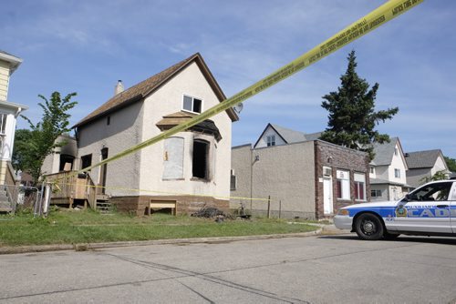 ZACHARY PRONG / WINNIPEG FREE PRESS  A fire on Young St. sent four people to the hospital including one man who is in critical condition. July 16, 2016.