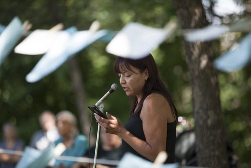 RUTH BONNEVILLE / WINNIPEG FREE PRESS  Angelina McLeod from Shoal Lake 40 First Nation, talks to a crowd  gathered at a 13 Fires event at Steven Juba Park to  discuss  the water issues facing his reserve Saturday.    See Alex Paul story.   July 16, 2016