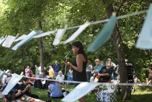 RUTH BONNEVILLE / WINNIPEG FREE PRESS  Angelina McLeod from Shoal Lake 40 First Nation, talks to a crowd  gathered at a 13 Fires event at Steven Juba Park to  discuss  the water issues facing his reserve Saturday.    See Alex Paul story.   July 16, 2016