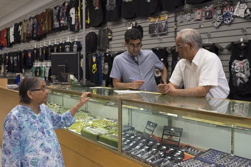 ZACHARY PRONG /  WINNIPEG FREE PRESS  From left to right, Sartaj, Jasbir and Gurinder Nirula at their store on Portage Ave. Sartaj and Jasbir opened the shop 40 years ago. July 14, 2016.