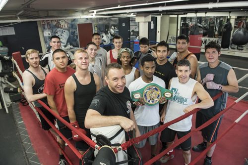 DAVID LIPNOWSKI / WINNIPEG FREE PRESS  Professional boxer and spinal cord injury activist from New York, Boyd Melson with Pan Am Place residents, at Pan Am Place Sunday July 17, 2016. Pan Am Place provides a home and guidance for approximately 30 young men in the Exchange District. They become part of the Pan Am Boxing program and integrate into the community while they complete education and job training.