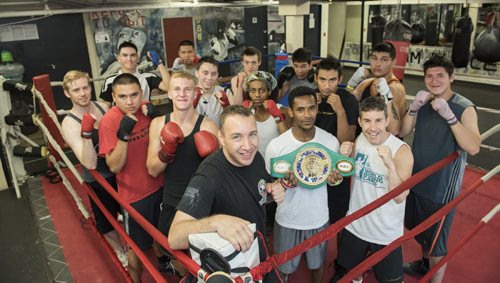 DAVID LIPNOWSKI / WINNIPEG FREE PRESS  Professional boxer and spinal cord injury activist from New York, Boyd Melson with Pan Am Place residents, at Pan Am Place Sunday July 17, 2016. Pan Am Place provides a home and guidance for approximately 30 young men in the Exchange District. They become part of the Pan Am Boxing program and integrate into the community while they complete education and job training.