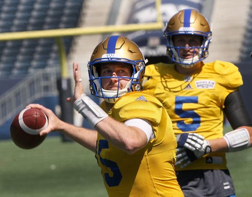 JOE BRYKSA / WINNIPEG FREE PRESS Bombers QB Matt Nicols, left, at practice Monday at IGF Field with QB Drew Willy in rear. Winnipeg Blue Bombers are in preparation for a home game this Thursday against the Calgary Stampeders  - July 18, 2016 -(See Jeff Hamilton story)
