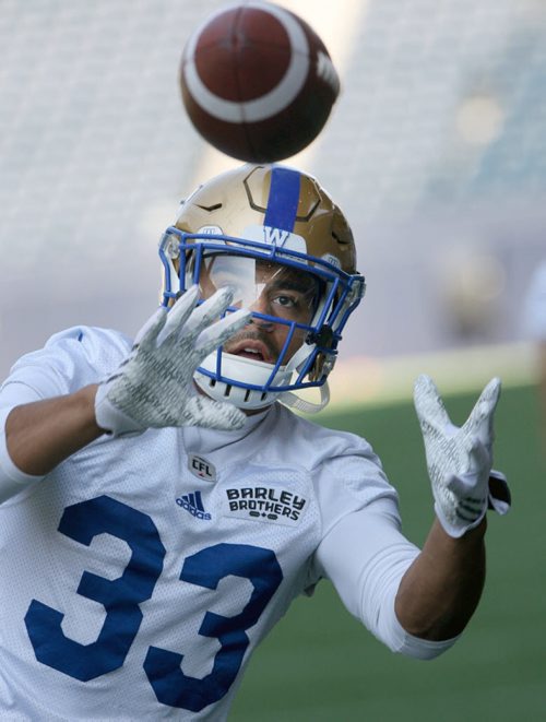 JOE BRYKSA / WINNIPEG FREE PRESS  Bombers head Andrew Harris catches a football during drills at practice Monday at IGF Field. Winnipeg Blue Bombers are in preparation for a home game this Thursday against the Calgary Stampeders  - July 18, 2016 -(See Jeff Hamilton story)