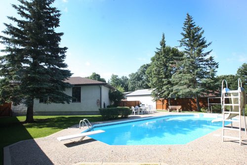 JOE BRYKSA / WINNIPEG FREE PRESS 1145 Rue des Trappistes in St Norbert- rear pool   - July 18, 2016 -(See  Todd Lewys story)