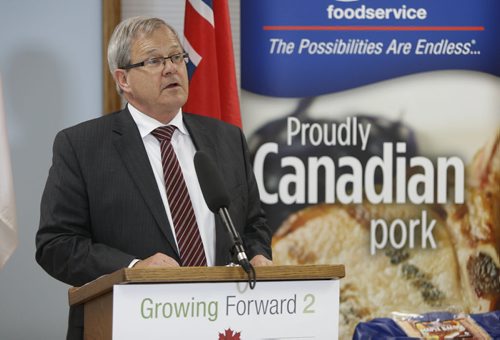 WAYNE GLOWACKI / WINNIPEG FREE PRESS



Lawrence MacAulay, Federal Agriculture Minister at the announcement Monday with the details of a new expansion of Maple Leafs bacon processing plant.   Murray McNeill story    July 18 2016