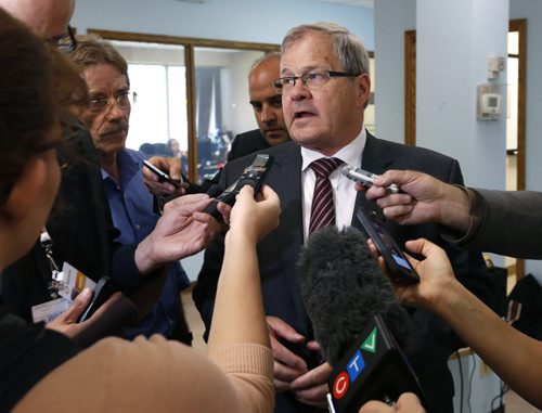 WAYNE GLOWACKI / WINNIPEG FREE PRESS

Lawrence MacAulay, Federal Agriculture Minister speaks to reporters after the announcement Monday with the details of a new expansion of Maple Leafs bacon processing plant.   Murray McNeill story    July 18 2016