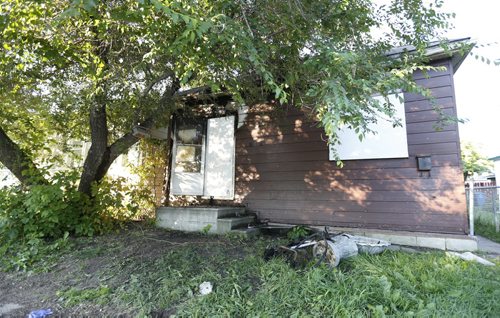 WAYNE GLOWACKI / WINNIPEG FREE PRESS    A fire Sunday night damaged a house in the 1800 block on Logan Ave.   July 18 2016