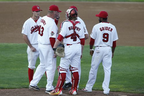 JOHN WOODS / WINNIPEG FREE PRESS Winnipeg Goldeyes manager Rick Forney talks to his pitcher Kevin McGovern (20) during a game against the St Paul Saints Monday, July 18, 2016.