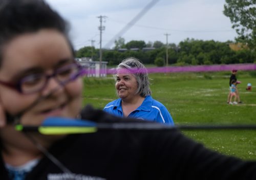 ZACHARY PRONG / WINNIPEG FREE PRESS  Deb Clark,right,  a member of the St. Sebastianette Archery Club, watches as Fran Messina takes a shot. June 29, 2016.