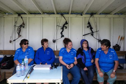 ZACHARY PRONG / WINNIPEG FREE PRES  Members of the St. Sebastianette Archery Club take shelter from the rain. From left to right, Carol Crawford, Leona Vandale, Danielle Arcand, Teresa Hurd and Pat Vouriot. June 29, 2016.