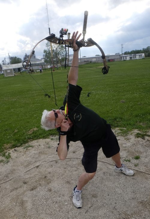 ZACHARY PRONG / WINNIPEG FREE PRESS  Ray Cheys, a member of the Robin Hood Archery Club, takes a shot. Chess has been a member of the club for decades and has been the club's "King Shooter" numerous times. This honour is awarded to the club member who shoots off the first King Bird (the highest bird on the pole) of the season. July 13, 2016.